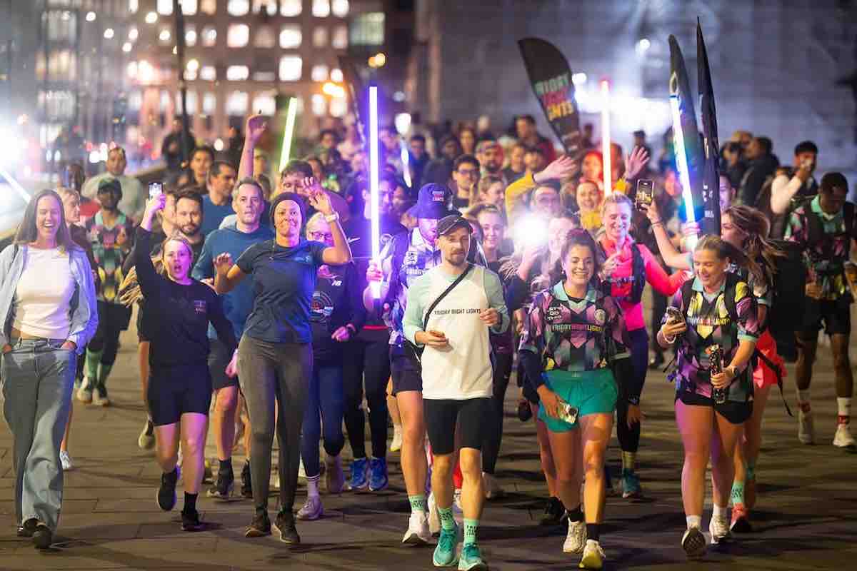 Runners in colourful run gear for Friday Night Lights in London