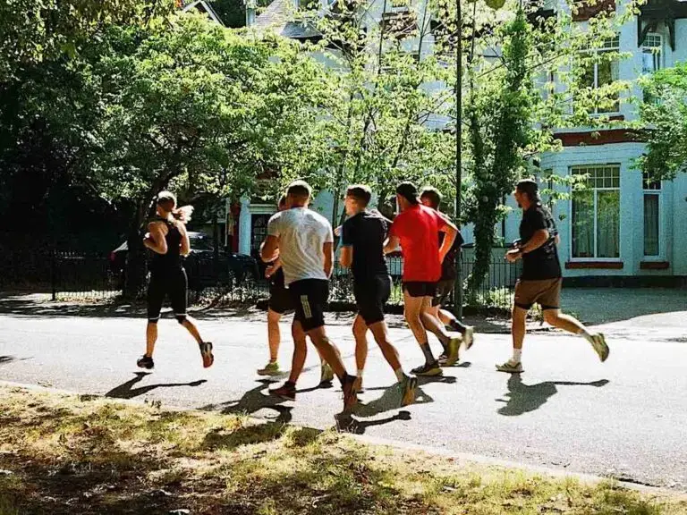 A group of ALTUS runners on Hull's leafy residential streets